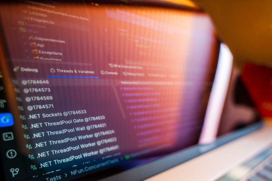 Focused view of a computer screen displaying code and debug information.